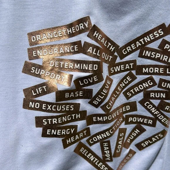 Orangetheory white tank with gold lettering and open slit in back - Picture 2 of 9